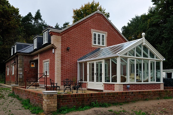 Hardwood spray finished Conservatory with outward opening doors