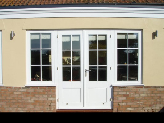 French double doors with side lights and bottom panels