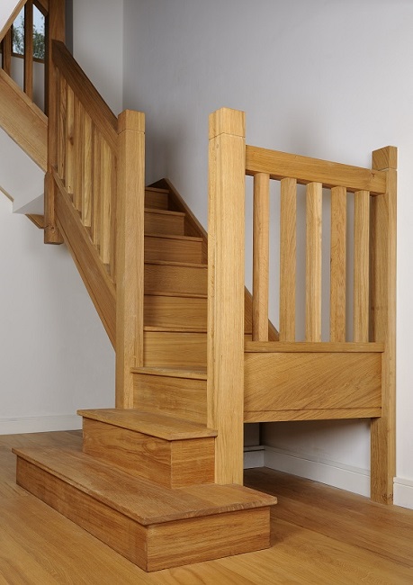 Oak staircase with square chunky newels, spindles and double square curtail