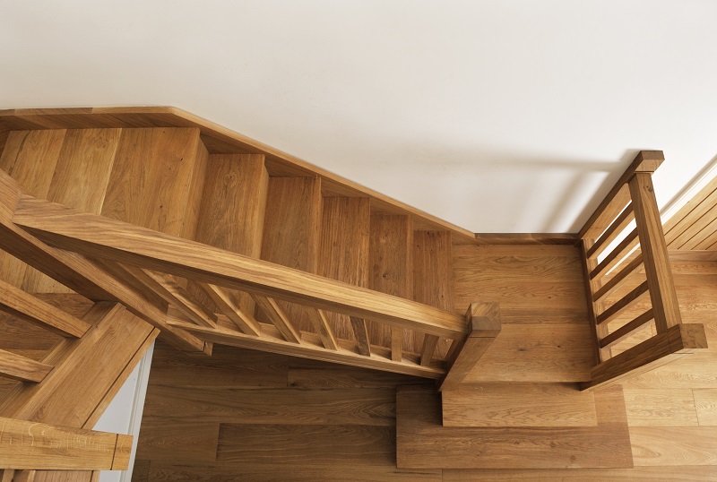 Oak staircase with square chunky newels, spindles and double square curtail.4